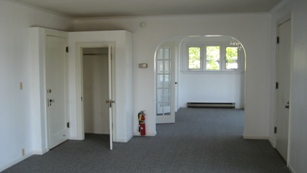 Living room looking West into dining room